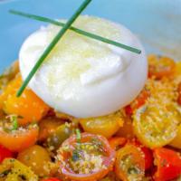 Burrata & Heirloom Tomatoes  · Burrata cheese, heirloom tomatoes, parmesan, breadcrumbs, fresh herbs, preserved lemon, fenn...