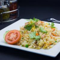 Crab Fried Rice · Served with real crab meat, peas, carrot, onions and egg.