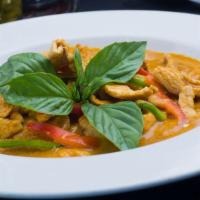 Panang Curry · Roasted curry with bell peppers and sweet basil in coconut milk. Spicy.