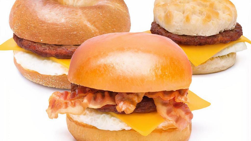 Sausage, Egg & Cheese · Pork or turkey sausage, egg, cheddar cheese, and house spread on your choice of brioche bun, english muffin, biscuit, or plain bagel. Bacon optional.