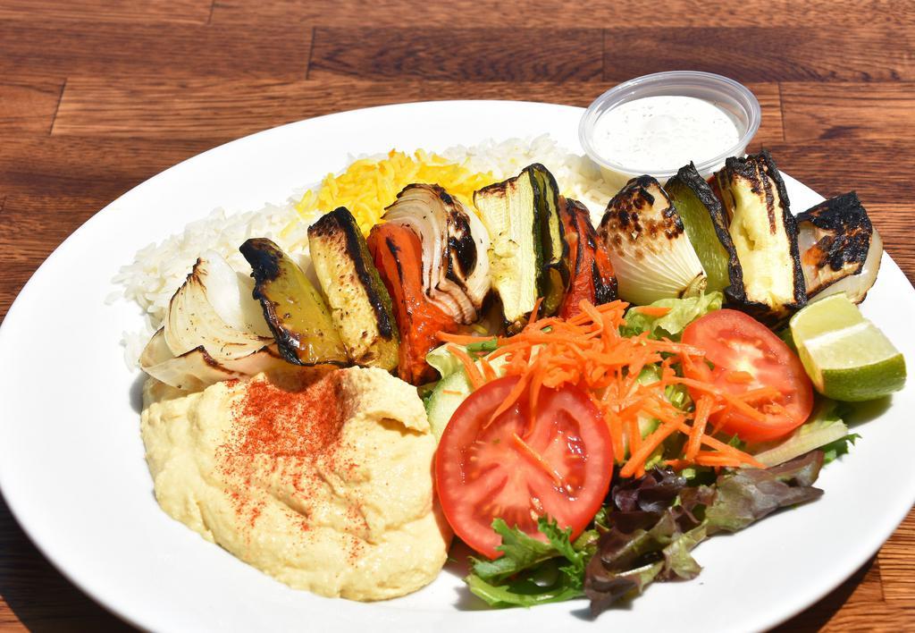 Veggie Kabob · Gluten-free and vegetarian. A combination of grill bell pepper, zucchini, onion, and tomato.