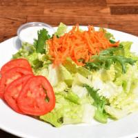 Green Salad · Gluten-free and vegetarian. Romaine lettuce, spring green mix, tomato, Persian cucumber and ...