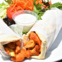 Koobideh · Grilled ground beef, chicken or lamb with lettuce, tomato, pickles and house dressing.