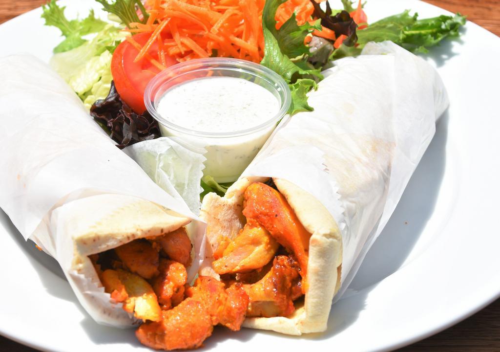 Koobideh · Grilled ground beef, chicken or lamb with lettuce, tomato, pickles and house dressing.