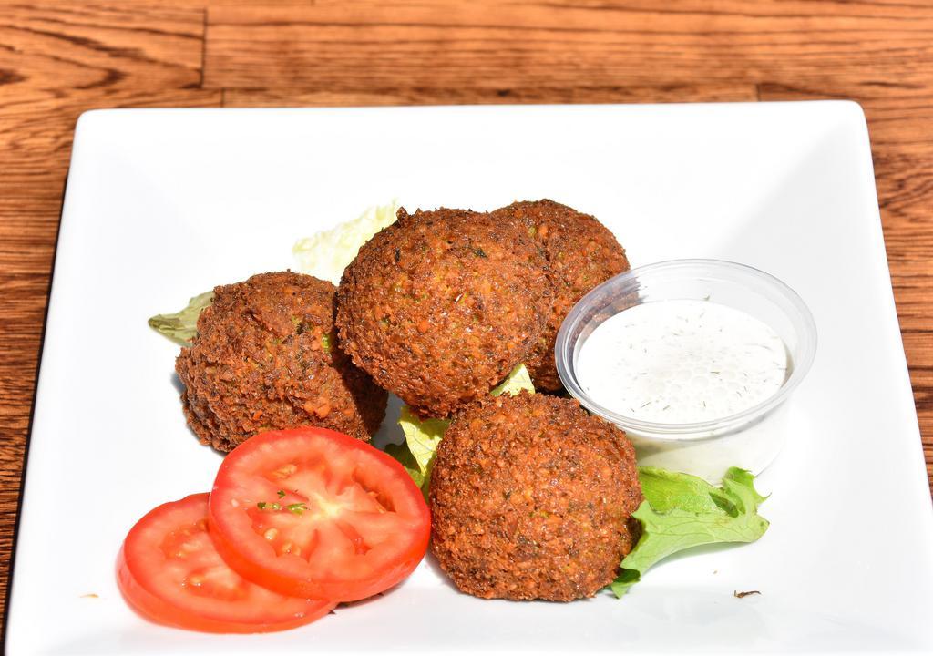 Falafel (4 Pieces) · Gluten-free and vegetarian. Vegetarian patties from garbanzo and spices. Served with hummus.
