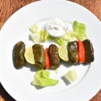 Dolmeh · Gluten-free and vegetarian. Six pieces stuffed grape leaves with rice, fresh herbs and seaso...