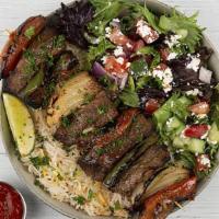 Beef Kabob Plate · Chargrilled cubes of beef served with basmati rice, side salad, fresh pita and your choice o...