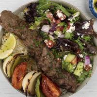 Beef Koobideh Kabob Plate · Ground seasoned beef kabobs served with basmati rice, side salad, fresh pita and your choice...