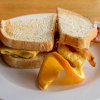 Break-Off Breakfast Sandwich · Egg, cheese, choice of meat (bacon or sausage), choice of toast (white, wheat, English muffi...