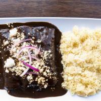 Enchiladas De Mole · 3 chicken enchiladas served with a side of rice.