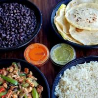 Family Pack - (Serves 5 ) - Chicken · Grilled chicken and veggies, rice, beans and 15 tortillas.