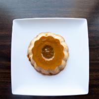 Flan · Homemade flan topped with dulce de leche (caramel)