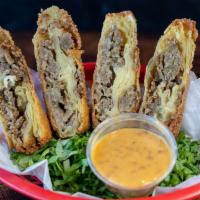 Cheesesteak Egg Rolls · Each Order Comes with 2 Eggrolls, Served with Spicy Nacho Cheese
