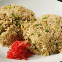 Pork Belly Fried Rice · Thick-cut pork belly wok-fried with
egg, onion, and lightly seasoned with soy and sesame fla...