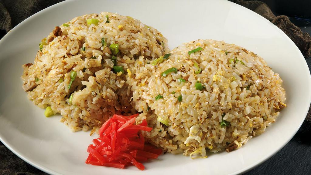 Pork Belly Fried Rice · Thick-cut pork belly wok-fried with
egg, onion, and lightly seasoned with soy and sesame flavors