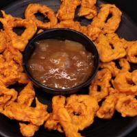 Appetizer Calamari · Marinated squid deep-fried with chana besan spices. Served with sweet mango chutney.