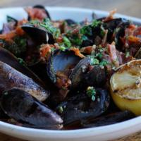 Cozze · Gluten free. Steamed Pei mussels, preserved lemons, garlic, fresh herbs, prosecco, chili fla...