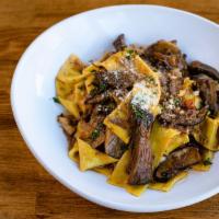 Pappardelle Bruno · Chianti braised short ribs, homemade pappardelle, roasted mushrooms.