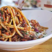 Bucatini Di Cinghiale · Homemade spicy wild boar sausage, sweet peppers, broccolini, treviso, pecorino romano.