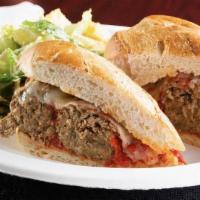 Mercy Mercy Meatball · Three sliced meatballs smothered in marinara and melted provolone.