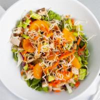 Chinese Chicken Salad · Mandarin oranges, sesame seeds, green onions, crispy noodles, lettuce, shredded carrots, red...