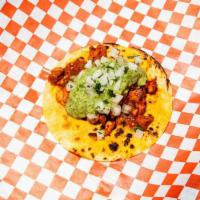 Chicken Taco · Marinated in Chipotle-Achiote, Salsa Arbol, Onion, Cilantro, Avocado Salsa, Corn Tortilla