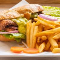 Torta (Àla Carte) · Sandwich with beans, lettuce, tomatoes, guacamole, & sour cream. Your choice of meat.
