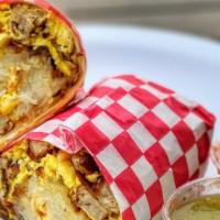 Sausage Breakfast Burrito · Includes Scrambled Eggs, Sausage, Hashbrown, Cheese & Pico De Gallo. Comment for adjustments!