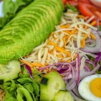 Large Mixed Green Salad · Green Leaf Lettuce with Tomato, Red Onions, Cucumber, Cheese, Hard Boiled Egg, Avocado, and ...