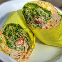 Turkey Bacon Salad Wrap · Turkey and Bacon wrapped with Green Leaf Lettuce, Tomatoes, Cheese, and your choice of Dress...