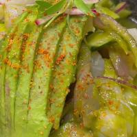 Aguachiles · shrimp cooked in fresh lime juice, red onion, serrano chili, cucumber, topped with cilantro,...