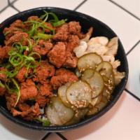 Karaage Don  · koji marinated fried chicken, seasoned 
rice, charred cabbage, pickles, tokyo 
negi, nori, s...