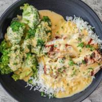 Zak'S Family Broccoli & Cheese Chicken · Breast of chicken seasoned, pan fried with fresh broccoli, Zak's house made cheese sauce ser...