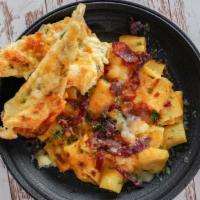 Zak'S Marconi & Cheese · Zak's Marconi and cheese noodles, five cheese blend. Zak's house made bacon then baked to pe...