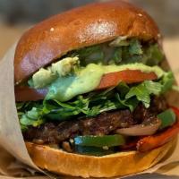 Earth Burger · Veggie patty, grilled red onions, grilled bell pepper, grilled jalapeno, arugula, tomatoes, ...