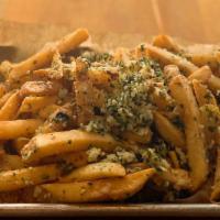 Chomp Fries · French fries tossed in Parmesan cheese and garlic butter.