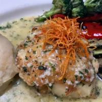 Grilled Chilean Sea Bass · Grilled Chilean Sea Bass Served with Mashed Potatoes & Sautéed Vegetables in a Garlic Butter...