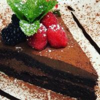 Chocolate Cake · with Chocolate Sauce