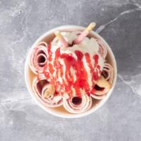 Strawberry Cheesecake · Cheesecake ice cream mixed with sliced strawberries.  Toppings:  whipped cream, strawberry s...