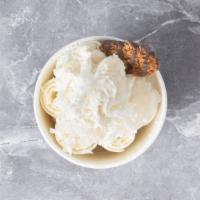 Coconut · Coconut ice cream mixed with coconut flakes. Toppings: whipped cream, coconut flakes, lychee...