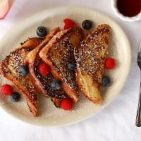Cinnamon French Toast · Fluffy brioche bread tossed into our crafted batter topped with fresh berries and confetti s...