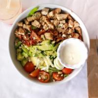 Cobb Salad · Hearty and delicious a mix of bacon, chicken breast, hard-boiled eggs, and avocado on a bed ...
