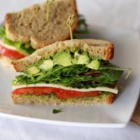 Love That Basil Sandwich · Mixed greens, gruyere cheese, avocado, fresh basil, tomato, cheese, and pesto. Served on cho...