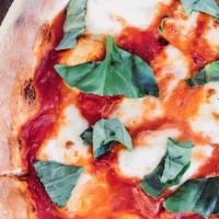Margherita Pizza · Fresh mozzarella, hand torn basil, marinara
