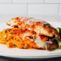 Chicken Parmigiana · Parmesan crusted free range chicken, marinara sauce, mozzarella, handmade tagliatelle with c...