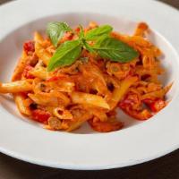 Penne Alla Vodka · Penne, Handmade Sausage, Peppers, Onions, Fresh Herbs, Spicy Vodka Pink Sauce.