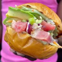 Grilled Ahi Tuna Sandwich · Micky's favorite,  raw or undercooked. Seared ahi tuna, cucumber, oriental slaw, avocado, wa...