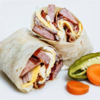 #28  Tvo Burrito · sausage, bacon, raw onion, cheese, eggs.