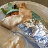 5: Shawarma Wrap · Choice of thinly marinated slices of, beef or chicken wrapped with fresh tomatoes, lettuce, ...