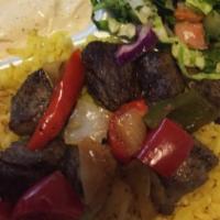 14: Beef Kabob · Grilled vegetable, garlic sauce, salad and pitta bread.